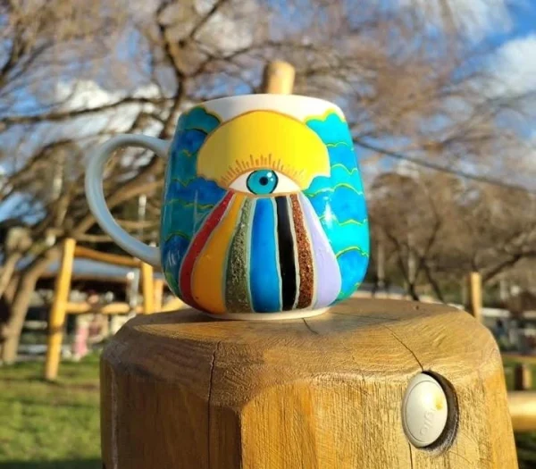 Taza sol con ojo y arcoíris 🌞